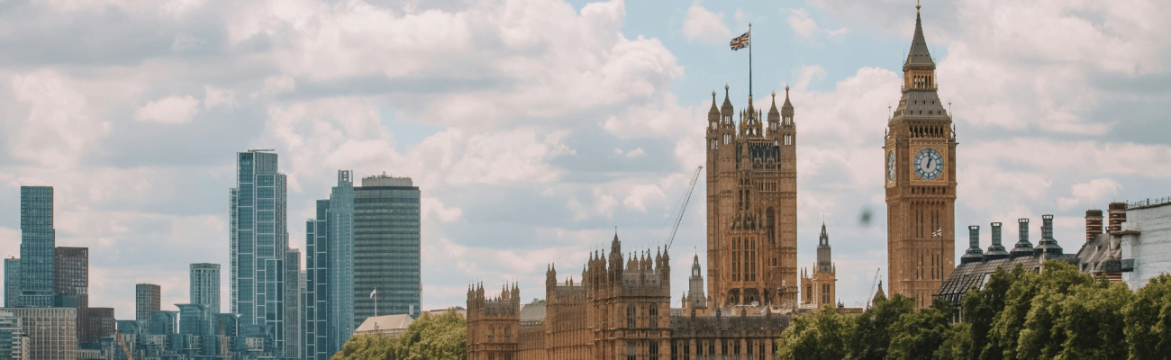 Big Ben clock tower stands tall beside the iconic Palace of Westminster in London, showcasing stunning architecture